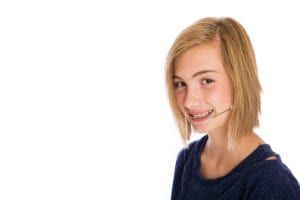 young girl with braces