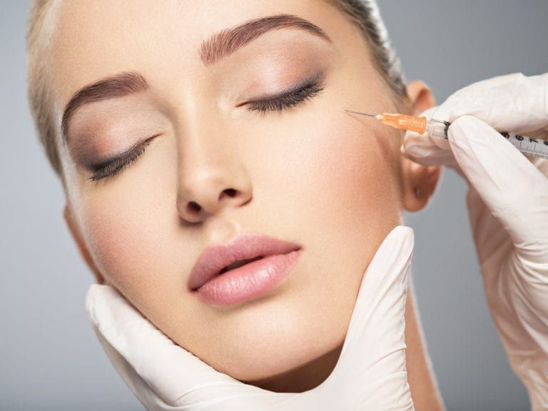 Female patient having dermal fillers