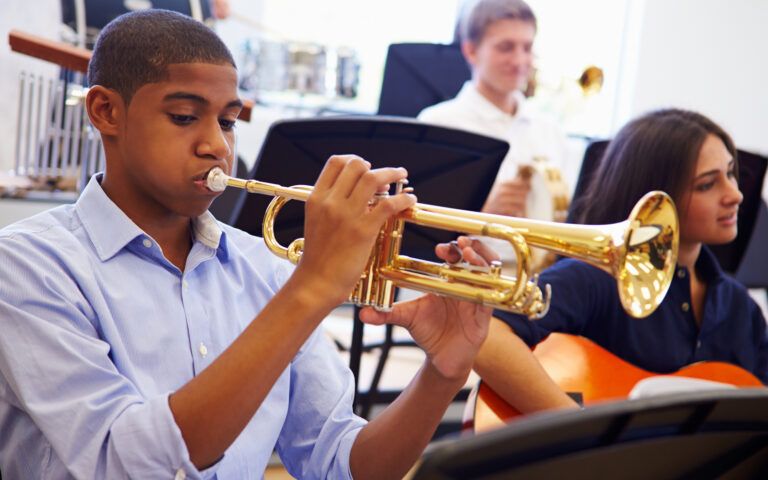 Band Student Playing Trumpet